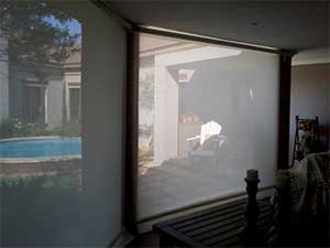 Beige transparent roller blinds from inside